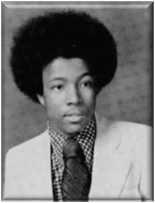 A young person wearing a suit and tie

Description automatically generated