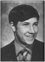 A person wearing a suit and tie

Description automatically generated